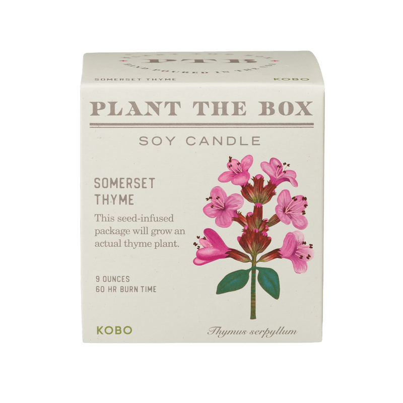 Front view of Plant the Box Somerset Thyme soy candle, 9 ounces, in seed-infused packaging with pink flowers on transparent background