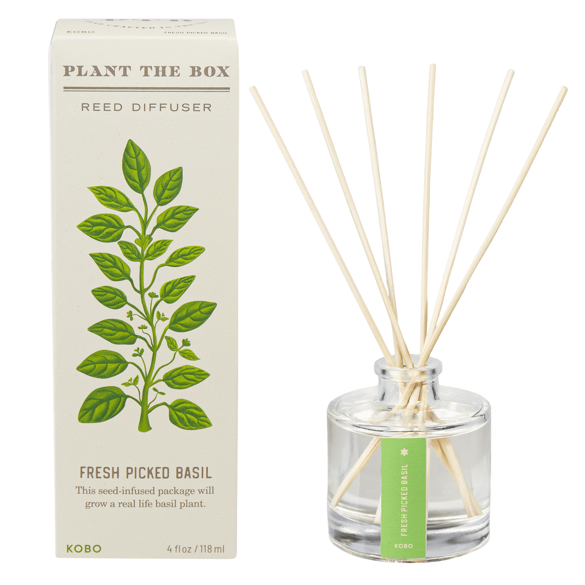 Front view of Fresh Picked Basil Plant the Box Reed Diffuser showcasing clear bottle, reeds, and illustrated basil box