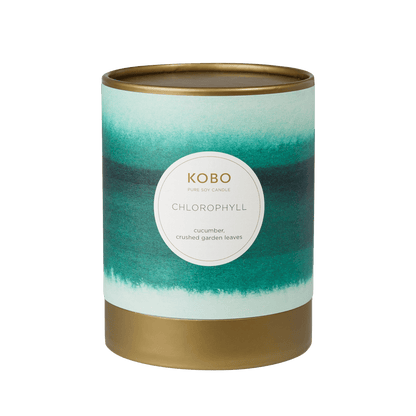 Front view of Chlorophyll Watercolor Candle showcasing teal watercolor design, gold rim and base with transparent background